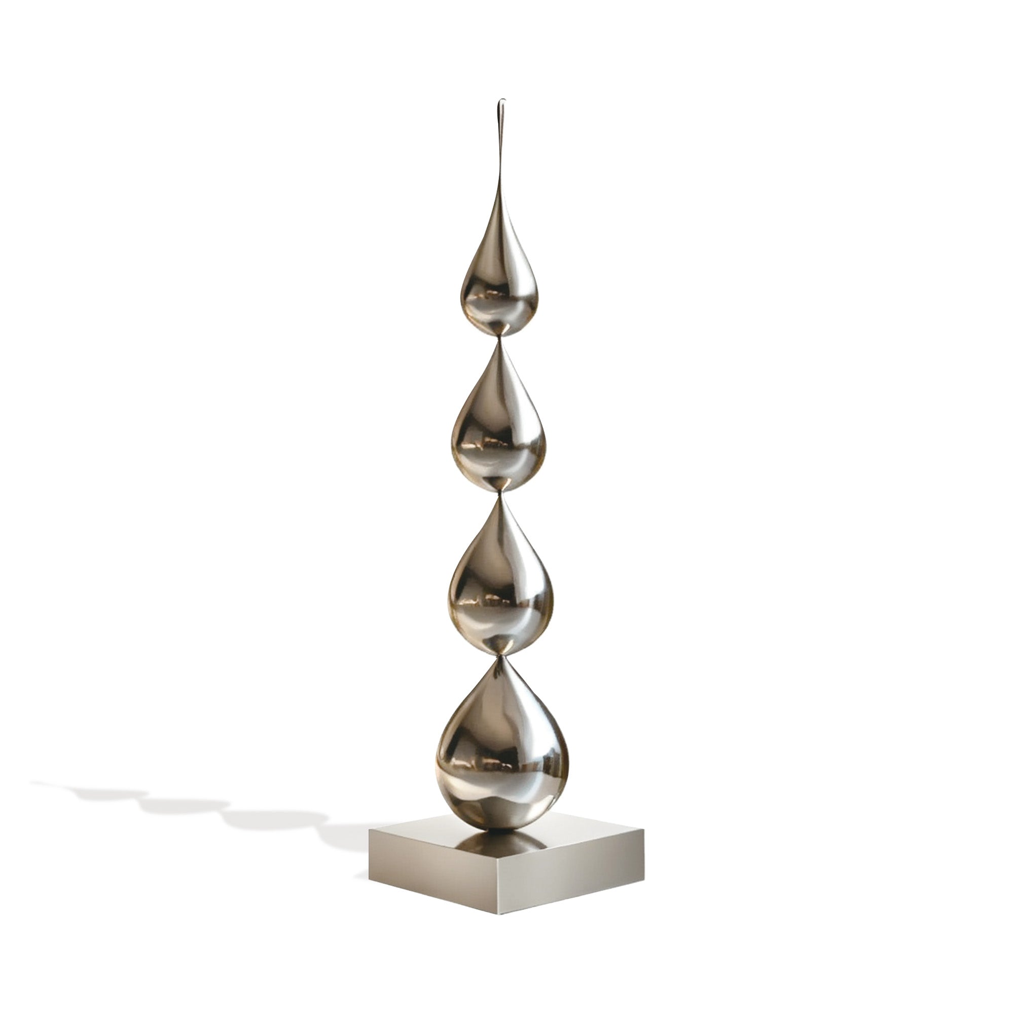 Metallic stainless steel  sculpture with three teardrop shapes on a white background