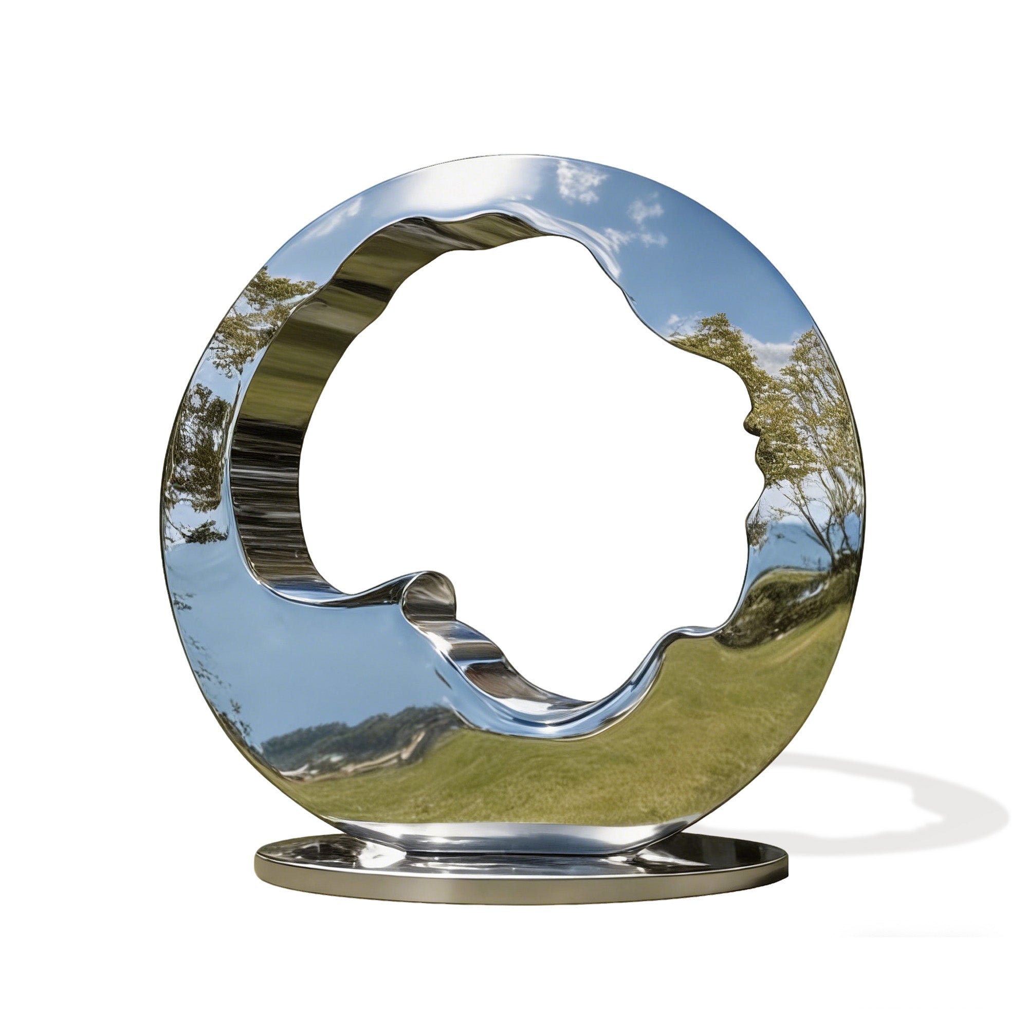 Metallic sculpture of a face within a circular frame on a white background