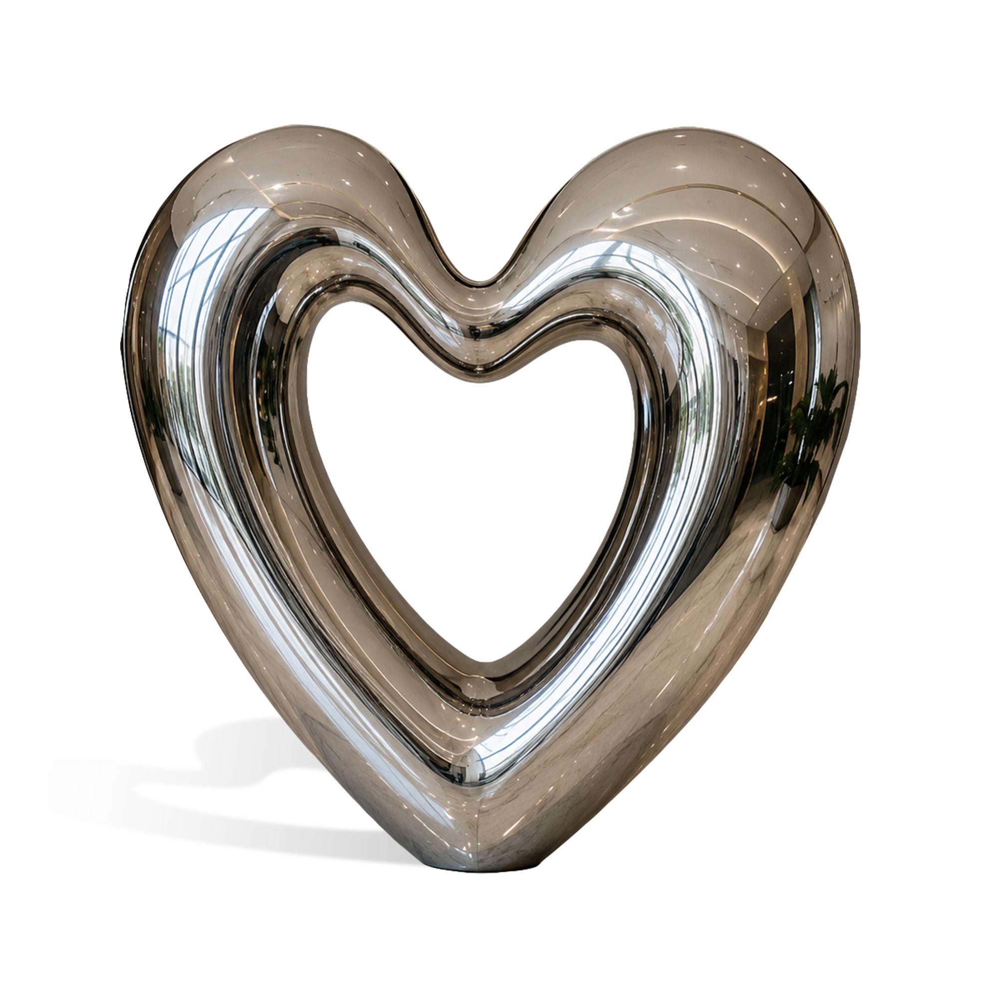 Polished stainless steel heart sculpture with smooth reflective surface and hollow heart design, showcasing modern abstract outdoor and indoor decorative art.