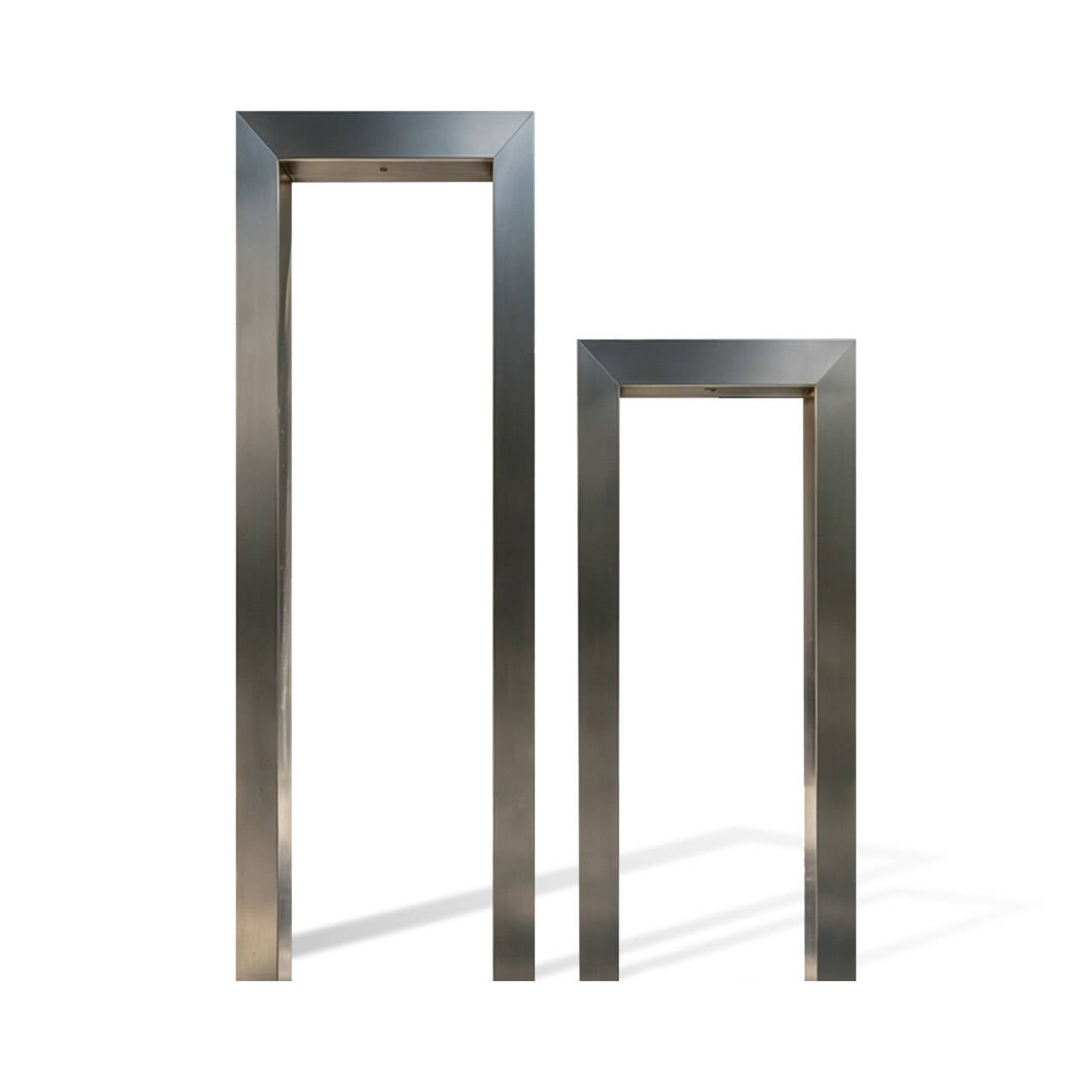 Brushed stainless steel rectangular frame fountain set with two different heights, minimalist portal structure, wide metal frame, top water outlet design, and white background for modern outdoor water feature projects