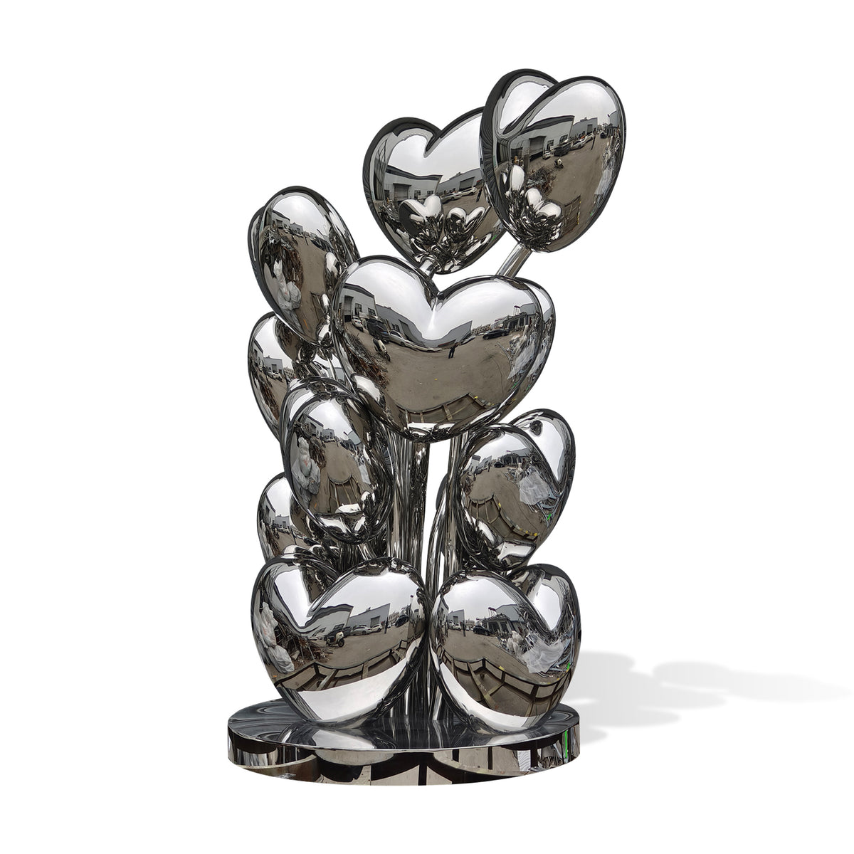 Modern stainless steel heart art sculpture with highly reflective mirror finish and layered heart shapes