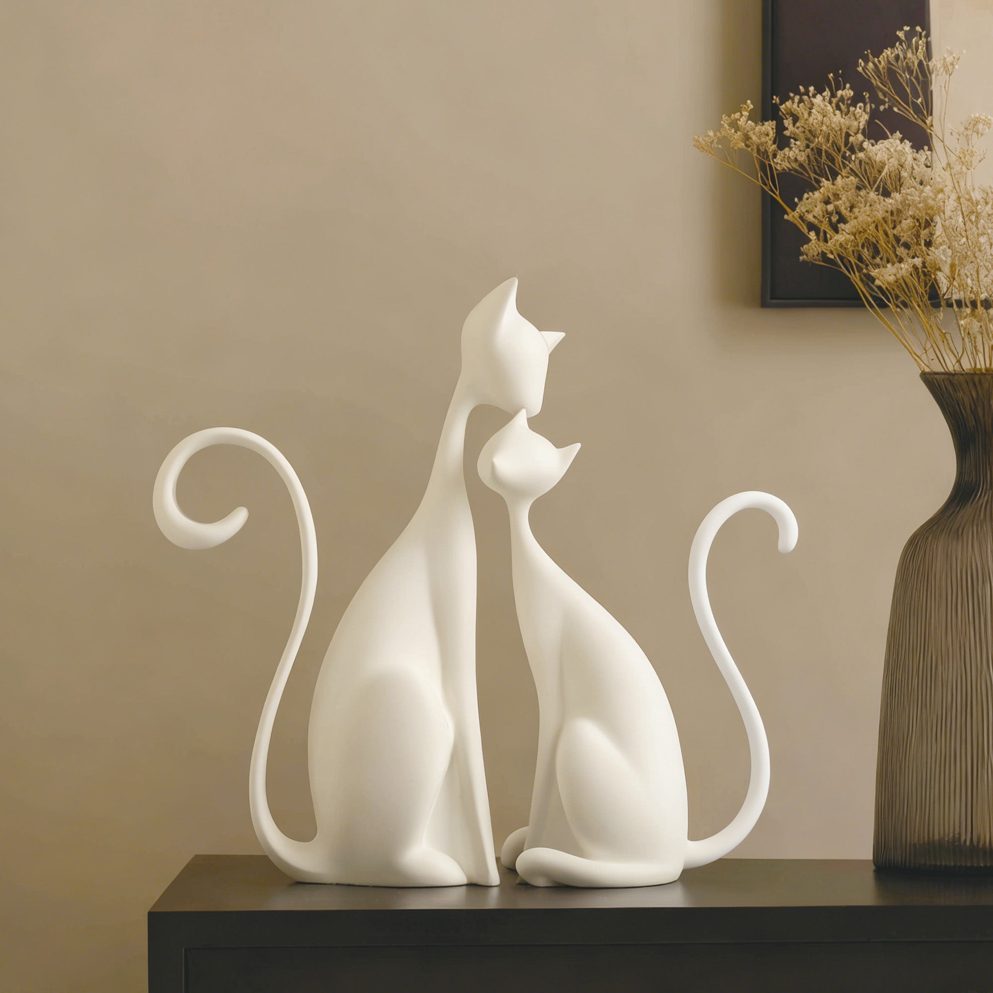 Contemporary “Soulmate Cats” bronze sculpture placed indoors on cabinet — elegant romantic cat couple art gift for home lovers and minimalist décor.