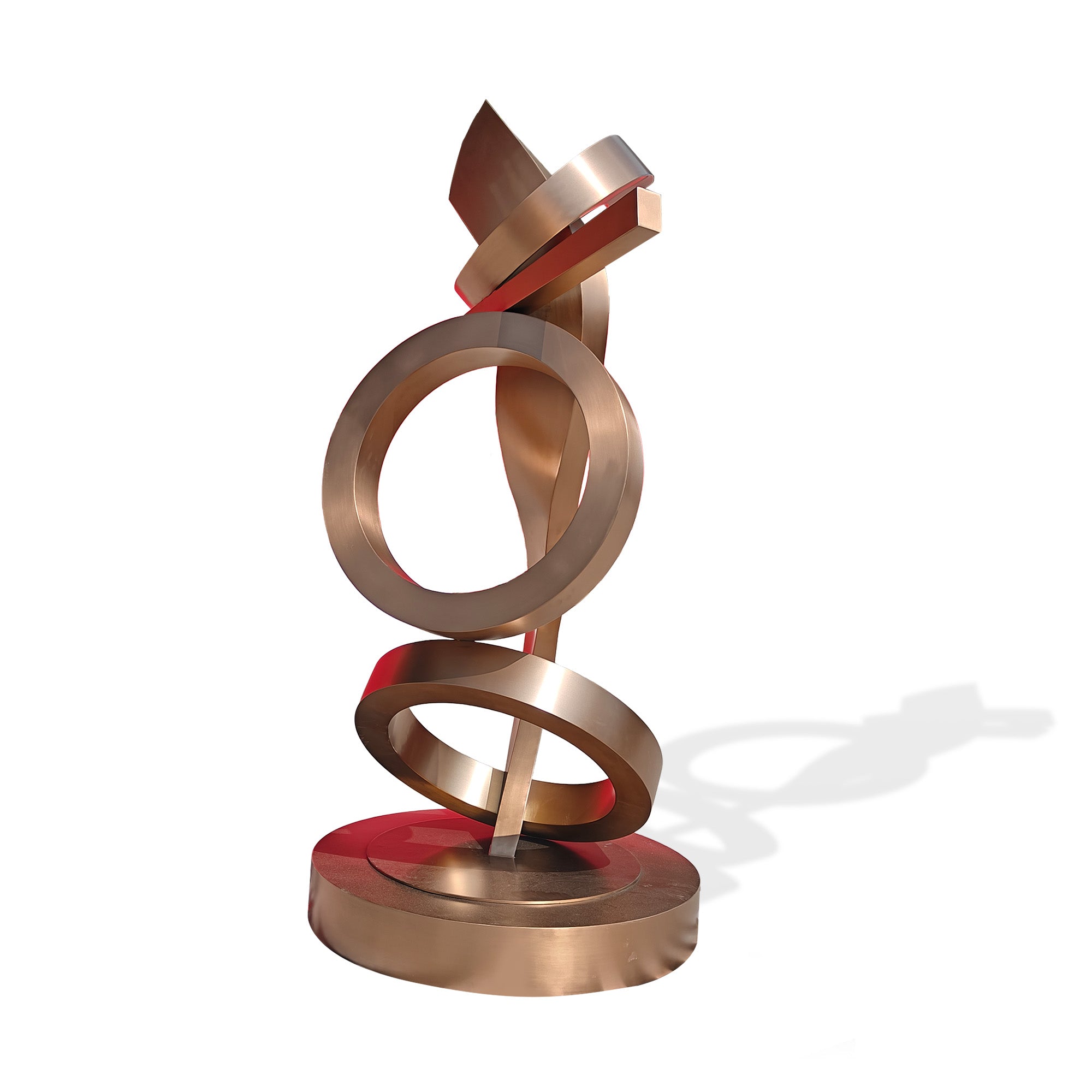 Angled view of modern rose gold hairline stainless steel abstract ring sculpture, contemporary decor piece for luxury interiors, white background.